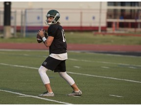 Quarterback Kyle Siemens goes to throw the ball during practice at Griffiths Stadium on Aug. 30, 2017.