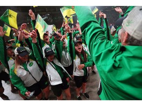 Team Saskatchewan arrives during the Parade of Athletes at the opening ceremony for the 2017 Canada Summer Games at the Bell MTS Place in Winnipeg, Man., on Friday, July 28, 2017. (Brook Jones/Postmedia Network)
