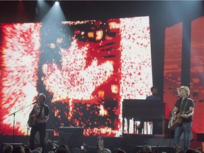 Country's night

Dean Brody wins multiple awards at CCMAs. B1

(Dean Brody performs at the Canadian Country Music Awards in Saskatoon, Sunday, Sept. 9, 2012. THE CANADIAN PRESS/Liam Richards)
Liam Richards,