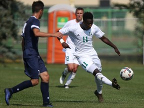 Huskies' soccer player Kwame Opoku (right) has earned conference third-star honours after his weekend performance.