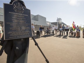 A plaque on display during the grand opening of Sylvia Fedoruk school in Saskatoon, Sask. on Friday, September 8, 2017. More than 50 children at a childcare facility located at the school were evacuated on Wednesday after a broken waterline caused flooding.