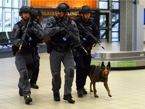 Saskatoon Police run through an emergency response exercise at the Saskatoon International Airport on September 13, 2017.