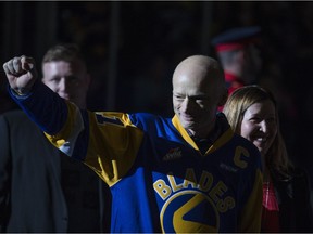 Bruce Gordon, a former Saskatoon Blades caption, is honoured before the home-opener game at SaskTel Centre in Saskatoon on Friday, September 22, 2017.