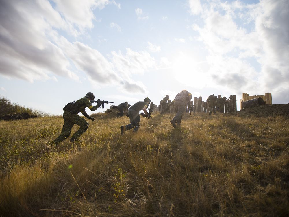 StarPhoenix Photos Second World War reenactment paintball game