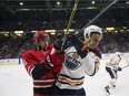 Carolina Hurricanes forward Nicolas Roy collides with Edmonton Oilers defenceman Darnell Nurse during a pre-season game at SaskTel Centre in Saskatoon, SK on Wednesday, September 27, 2017.