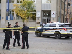 SASKATOON,SK--SEPT 27 2017-0927-NEWS-SHOOTING- Police are on scene after a reported shooting on 4th avenue south in Saskatoon, SK on Wednesday, September 27, 2017. (Saskatoon StarPhoenix/Kayle Neis)
Kayle Neis, Saskatoon StarPhoenix