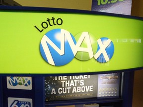 WINDSOR, ONTARIO - OCTOBER 16, 2016 - Ontario Lottery Corporation signs are displayed at the Downtown Smoke Shop in Windsor, Ontario on October 16, 2016.   The Lotto 649 jackpot has will be $64 Million on Saturday. (JASON KRYK/The Windsor Star)   LOTTO MAX,  LOTTO 649 ORG XMIT: POS1510161516318593 ORG XMIT: POS1512251640178880