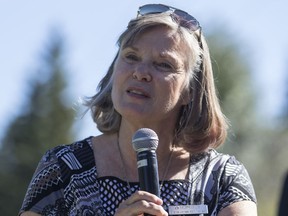 Diane Jones Konihowski speaks at a recent charity golf tournament in Calgary.