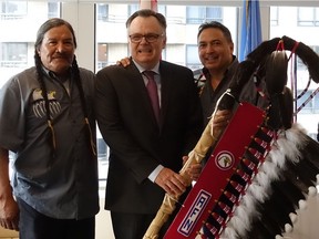 Assembly of First Nations National Chief Perry Bellegarde (right) was in New York City on Sept. 13, 2017, to gift a traditional Eagle Staff to His Excellency Marc-André Blanchard, Permanent Representative of Canada to the United Nations, to mark the 10th anniversary of the adoption of the United Nations Declaration on the Rights of Indigenous Peoples. From left: Ceremonial leader Marshall Dreaver of the Big River First Nation, His Excellency Marc-André Blanchard and National Chief Perry Bellegarde (Photo courtesy AFN)