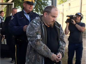 Normand Lavoie leaves Court of Queens Bench in Melfort, Sask., Monday, Sept.11, 2017. Lavoie was sentenced to three years in prison for killing three teenage boys when his semi hit their car in a construction zone in May 2015.