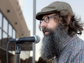 Marc Spooner a professor at the University of Regina, speaks at the Roof-Ready Regina alternative housing summit in front of the Delta Hotel in Regina on Oct 21, 2014. He's recently raised concerns about the province's recreational marijuana survey, saying the survey may be collecting data that could identify a respondent, despite the fact it's been called anonymous by government officials.