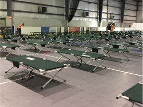 Red Cross workers prepared emergency shelter for forest fire evacuees on Aug. 29, 2017 at Henk Ruys Socccer Centre in Saskatoon