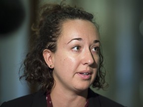 Nicole Sarauer, the interim leader of the NDP, speaks to reporters in the Legislative Building in Regina.