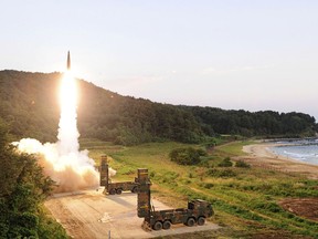 In this photo provided by South Korea Defense Ministry, South Korea's Hyunmoo II ballistic missile is fired during an exercise at an undisclosed location in South Korea, Monday, Sept. 4, 2017. In South Korea, the nation's military said it conducted a live-fire exercise simulating an attack on North Korea's nuclear test site to "strongly warn" Pyongyang over the latest nuclear test. Seoul's Joint Chiefs of Staff said the drill involved F-15 fighter jets and the country's land-based "Hyunmoo" ballistic missiles. The released live weapons "accurately struck" a target in the sea off the country's eastern coast, the JCS said.