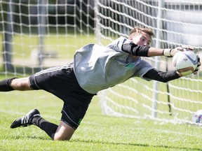 Patrick Pranger dives to make a save at a Huskies soccer training camp in Saskatoon on Thursday, August 10, 2017.