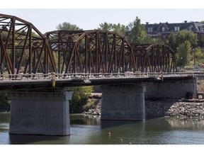The City of Saskatoon recognized $70 million in debt in 2017 from the P3 project to build two new bridges, including the downtown Traffic Bridge, seen here in August. The city's debt is expected to reach a record $411 million by the end of the year. (LIAM RICHARDS/The StarPhoenix)