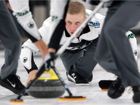 Team Saskatoon's Colton Flasch lines up the rock during the men's College Clean Restoration Curling Classic final against Team Kim from Korea at Nutana Curling Club on Oct. 2, 2017.