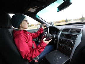 Saskatoon StarPhoenix reporter Andrea Hill tests out just how dangerous it is to drive distracted by texting and taking selfies while navigating a course set up by Saskatoon Police and SGI in Saskatoon on October 3, 2017.