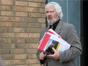 R.J. Ard, lawyer for former cabinet minister Bill Boyd, leaves Kindersley provincial court on Tues. Oct. 10.