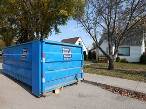 A disposal bin is parked on the street in front of a house in city park in Saskatoon on Oct. 11, 2017. Saskatoon city council opted for more consultation on a plan to start charging for the use of public right-of-ways like streets, alleys and sidewalks.