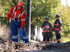 Saskatoon Police, Saskatoon Fire and Sask Energy respond to a report that a grader had struck a natural gas line in a back alley near Avenue T South and 20th Street West in Saskatoon on October 16, 2017. Gas was turned off at about 1:45 p.m. and left three homes in the area without gas service while repairs were made, SaskEnergy said in a news release.