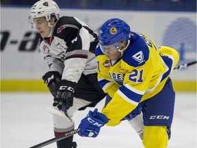 Lukus MacKenzie (right) has been traded from Saskatoon to Red Deer.