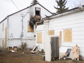 Burn damage is seen outside of a home at 326 Ave. F South in Saskatoon on Saturday, Oct. 28, 2017.