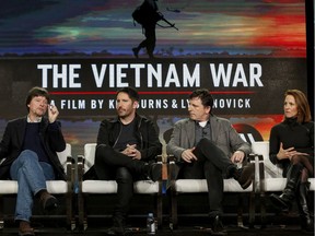 Ken Burns, left, Trent Reznor, Atticus Ross and Lynn Novick speak during PBS' The Vietnam War panel on Jan. 15, 2017, in Pasadena, Calif.