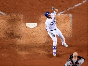 World Series - Houston Astros v Los Angeles Dodgers - Game Six

LOS ANGELES, CA - OCTOBER 31:  Joc Pederson #31 of the Los Angeles Dodgers celebrates after hitting a solo home run during the seventh inning against the Houston Astros in game six of the 2017 World Series at Dodger Stadium on October 31, 2017 in Los Angeles, California.  (Photo by Sean M. Haffey/Getty Images) ORG XMIT: 775063335

No more than 7 images from any single MLB game, workout, activity or event may be used (including online and on apps) while that game, activity or event is in progress.
Sean M. Haffey, Getty Images