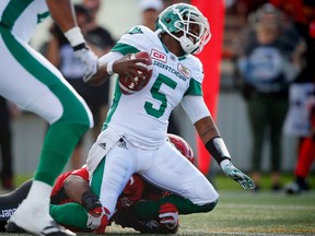 Saskatchewan Roughriders quarterback Kevin Glenn is shown July 22, when he was sacked five times in the first half by the host Calgary Stampeders.