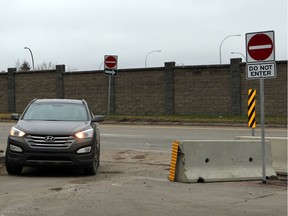 The barrier that was installed to prevent access to the Idylwyld Drive Freeway from Ninth Street East in Saskatoon is partly removed in this November 2015 photo.
