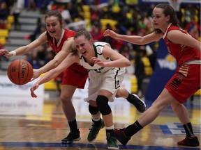 Saskatchewan Huskies' Libby Epoch can't hold on to the ball as she's swarmed by Laval Rouge et Or players during first half quarter-final action U Sports Women's Basketball action at the CARSA Performance Gym in Victoria, B.C., on Thursday, March 9, 2017.