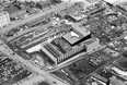 This 1968 aerial photo shows Centennial Auditorium in downtown Saskatoon as its grand opening approaches. The YMCA next to the Centennial Auditorium opened in 1969 and the Midtown plaza opened in 1970. The auditorium was built on the site of the Canadian National Railway Station, which was built in 1938 and demolished in 1966. (CP-68-4 Courtesy of the Saskatoon Public Library)