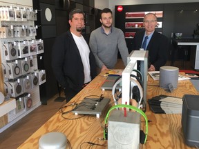 James Frost (left), Alan Johnson and Len Thomas at James Frost Luxury Outfitters in Saskatoon.