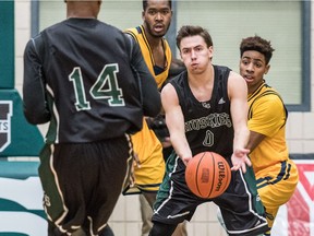 University of Saskatchewan Huskies guard Alex Ulruh passes the ball against the University of Brandon Bobcats in CIS Men's Basketball action at the PAC in Saskatoon on Saturday, November 19, 2016.