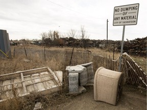 City of Saskatoon administration is proposing an increase in the fines for illegal dumping from $100 for a first offence to $500. This April 2016 photo shows material dumped at Avenue P and 14th Street. (GREG PENDER/The StarPhoenix)