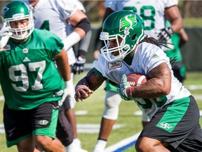 Trent Richardson, right, is to make his CFL debut for the Saskatchewan Roughriders on Saturday against the host Toronto Argonauts.
