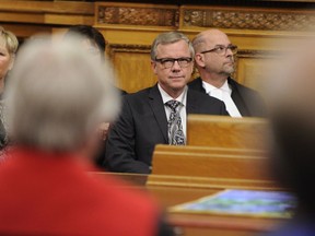 Saskatchewan Premier Brad Wall takes his seat the legislature for his last throne from the speech at the Saskatchewan Legislative Building in Regina, Wednesday, October 25, 2017