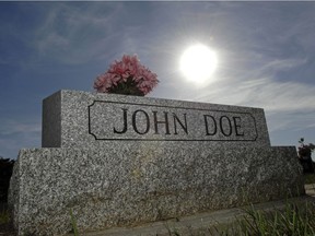 A stone marks John Doe's grave in a Regina cemetery. The unknown man took his life on a railway track in Regina on July 28, 1995 and has never been identified.