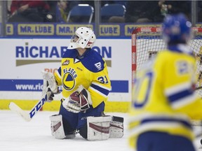 Saskatoon Blades goalie Ryan Kubic watches the puck fly past him during WHL action Friday at SaskTel Centre in Saskatoon.