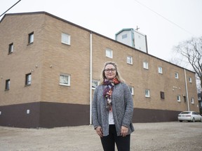 Lisa Kalesnikoff, who lives on Saskachtewan Crescent, stands near the Faith Alive Family Church on the corner of University Drive and 13th Street in Saskatoon, SK on Tuesday, October 31, 2017. Kalesnikoff is upset about a proposed tower that would be built on the church site. (Saskatoon StarPhoenix/Liam Richards)