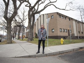 Lisa Kalesnikoff, who lives on Saskatchewan Crescent, stands near the Faith Alive Family Church on the corner of University Drive and 13th Street in Saskatoon on Tuesday, Oct. 31, 2017. Kalesnikoff is one of the opponents of a seven-storey condominium building planned for the site.