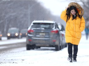 Yibei He walks to school through the snow in her warm parka which she brought from China in Saskatoon on November 1, 2017. (Michelle Berg / Saskatoon StarPhoenix)
Michelle Berg, Saskatoon StarPhoenix