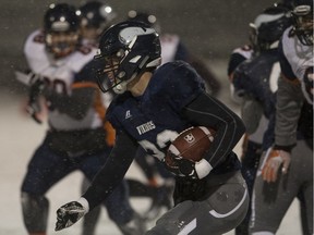 North Battleford Vikings JT Lamb runs the ball during the city high school football 3A finals at SMF Field in Saskatoon on Friday, Nov. 3, 2017.