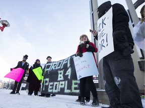 A group of protesters organized by Mobilize Saskatoon and Stop the Cuts gathered outside TCU Place before the Sask. Party leadership debate in Saskatoon on Saturday, Nov. 4, 2017.