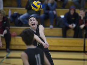 St. Joseph's Nathan Saretsky hits the ball during the 2017 city high-school volleyball championships.