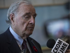 Former Prime Minister Paul Martin speaks to media after a talk given at the University of Saskatchewan's College of Law on Nov. 9, 2017.