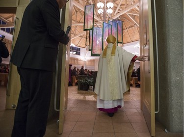 Most Rev. Mark Hagemoen, right, enters the Cathedral of the Holy Family prior to his installation as Bishop of the Saskatoon Roman Catholic diocese on Thursday, November 23, 2017.