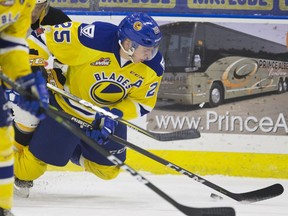 Saskatoon Blades defencemen Libor Hajek skates forward with the puck during the game Friday at SaskTel Centre in Saskatoon.