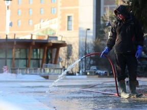 Devin Ostlund fills up the Meewasin skating rink on Spading Crescent during a bitterly cold morning in Saskatoon on December 4, 2016. City council backed more money for Meewasin during talks for a tight 2018 budget.